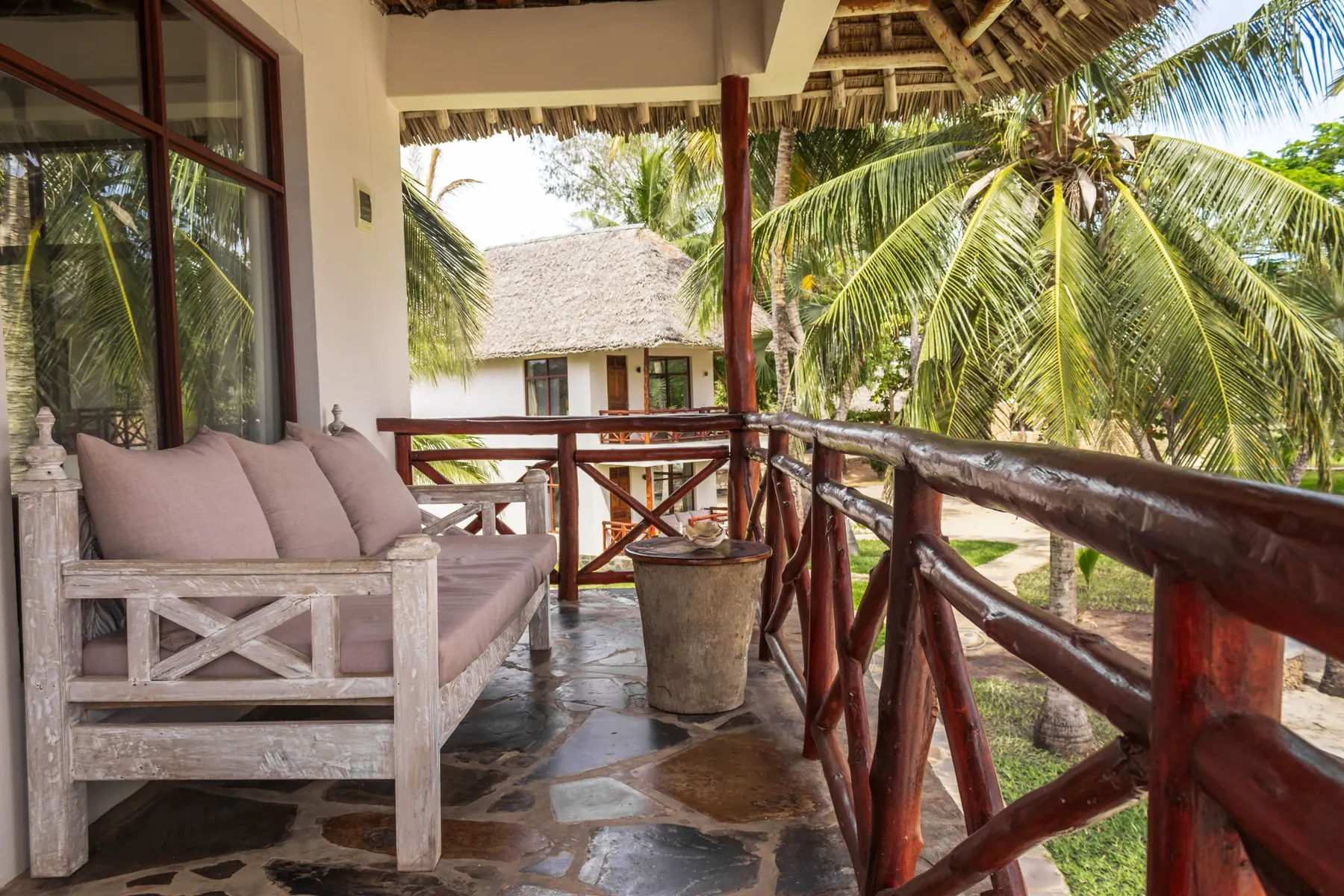 Balcony day bed overlooking the gardens