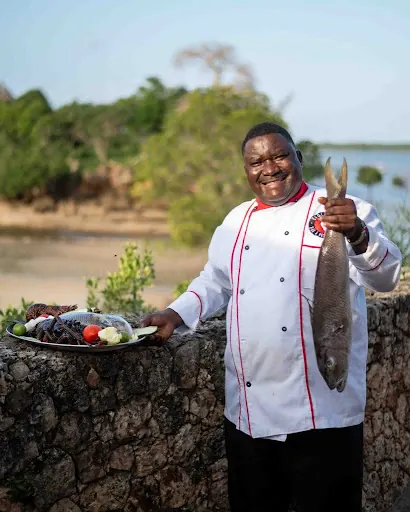 Chef presenting the fresh catch of the day